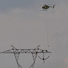 Helicopter electric transmission tower