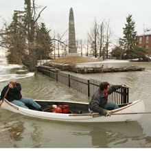 Flooded road and canoe