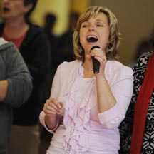 Kim Inch sings at the rehearsal for the Olympic Torch Relay event in Picton, Ontario.
